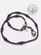 Necklace displayed on CJG Legacy Treasures branded card