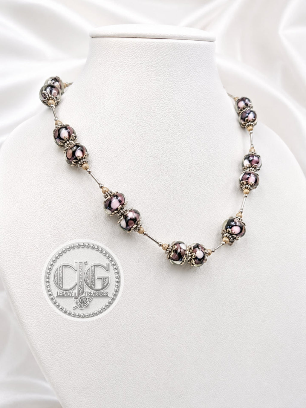 Close-up detail of glass trollbeads with Bali silver bead caps