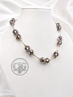 Close-up detail of glass trollbeads with Bali silver bead caps