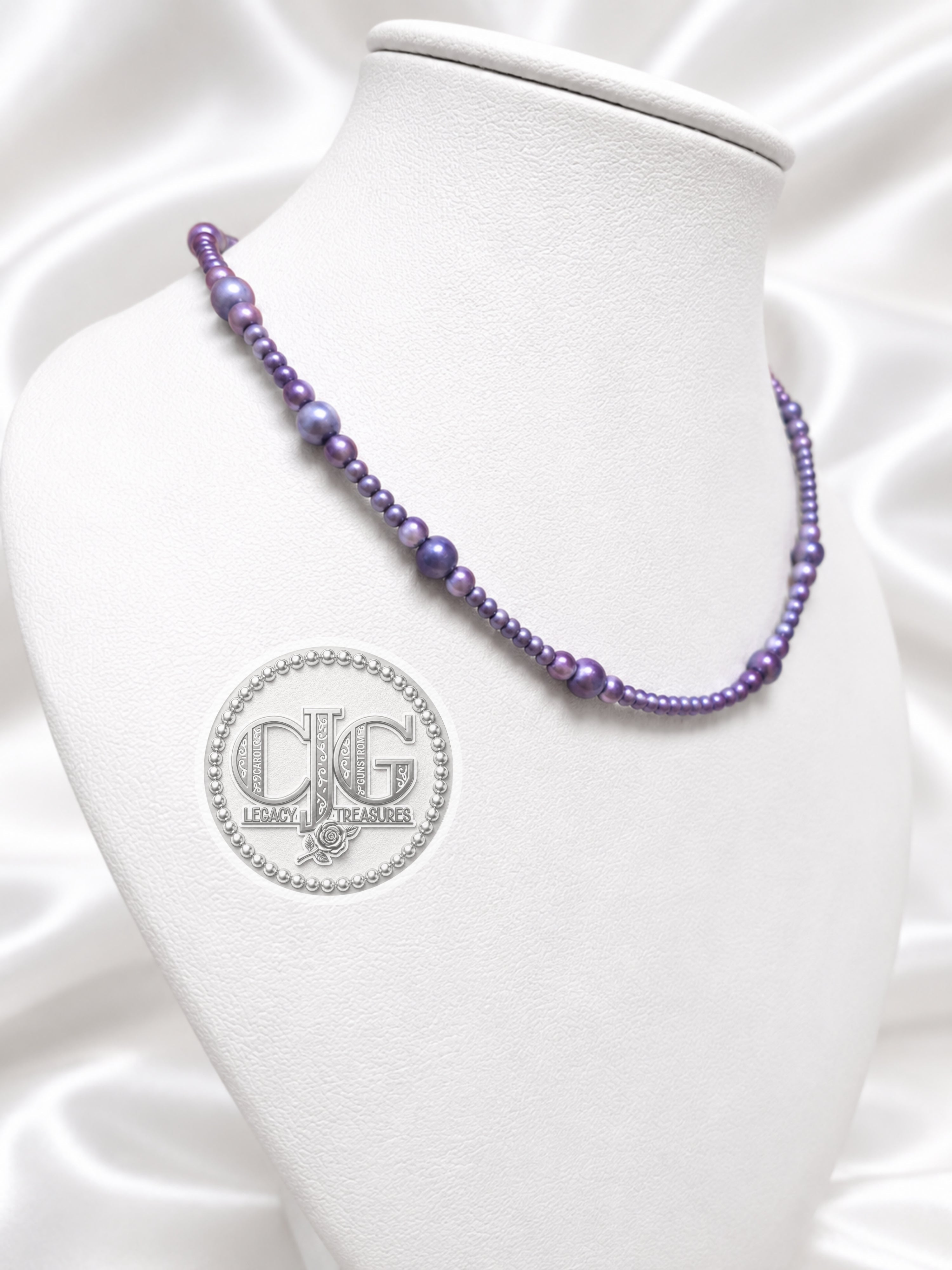 Close-up of graduated baroque pearl design in deep violet