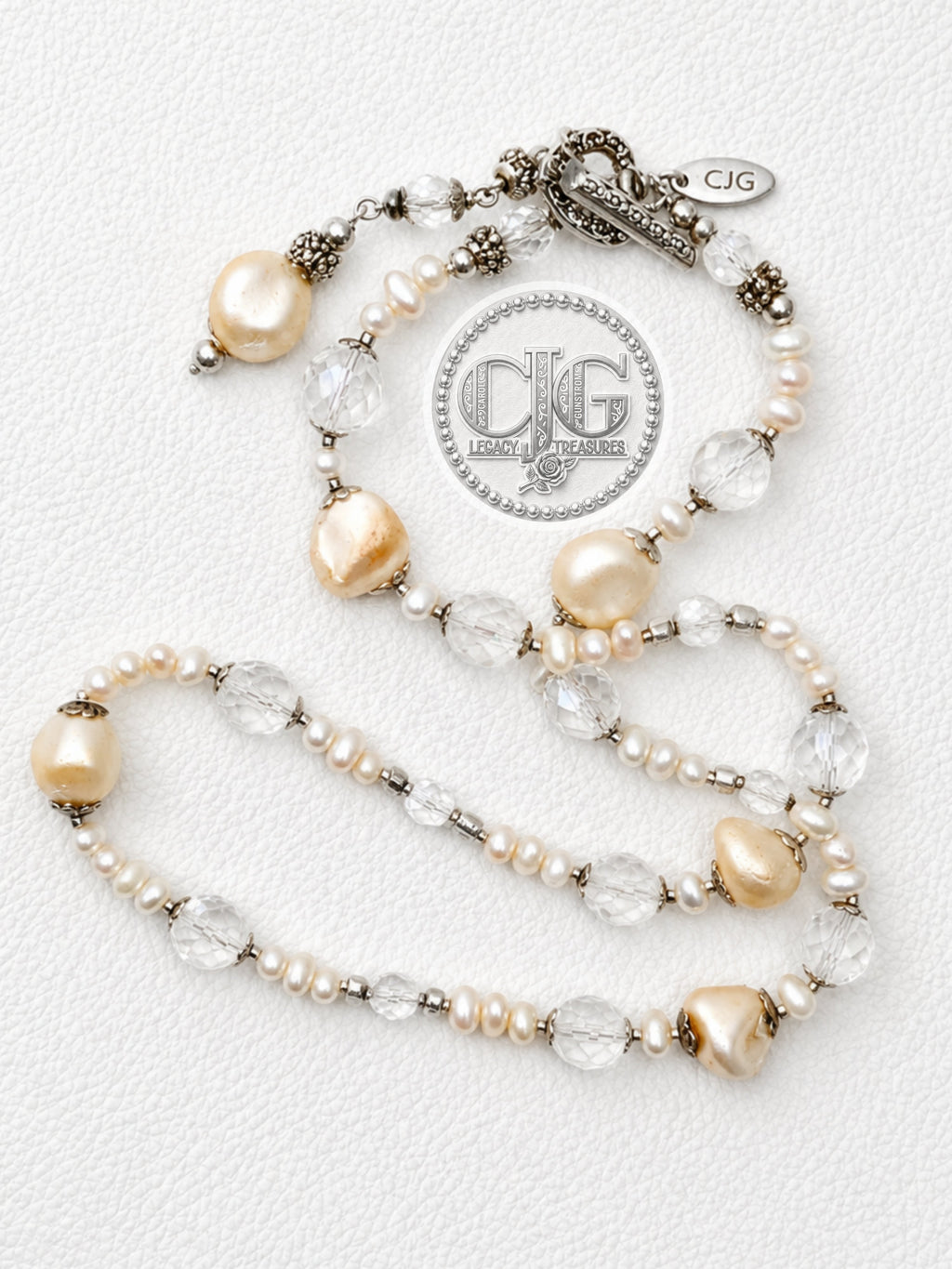 Close-up of champagne baroque pearls and faceted crystal beads
