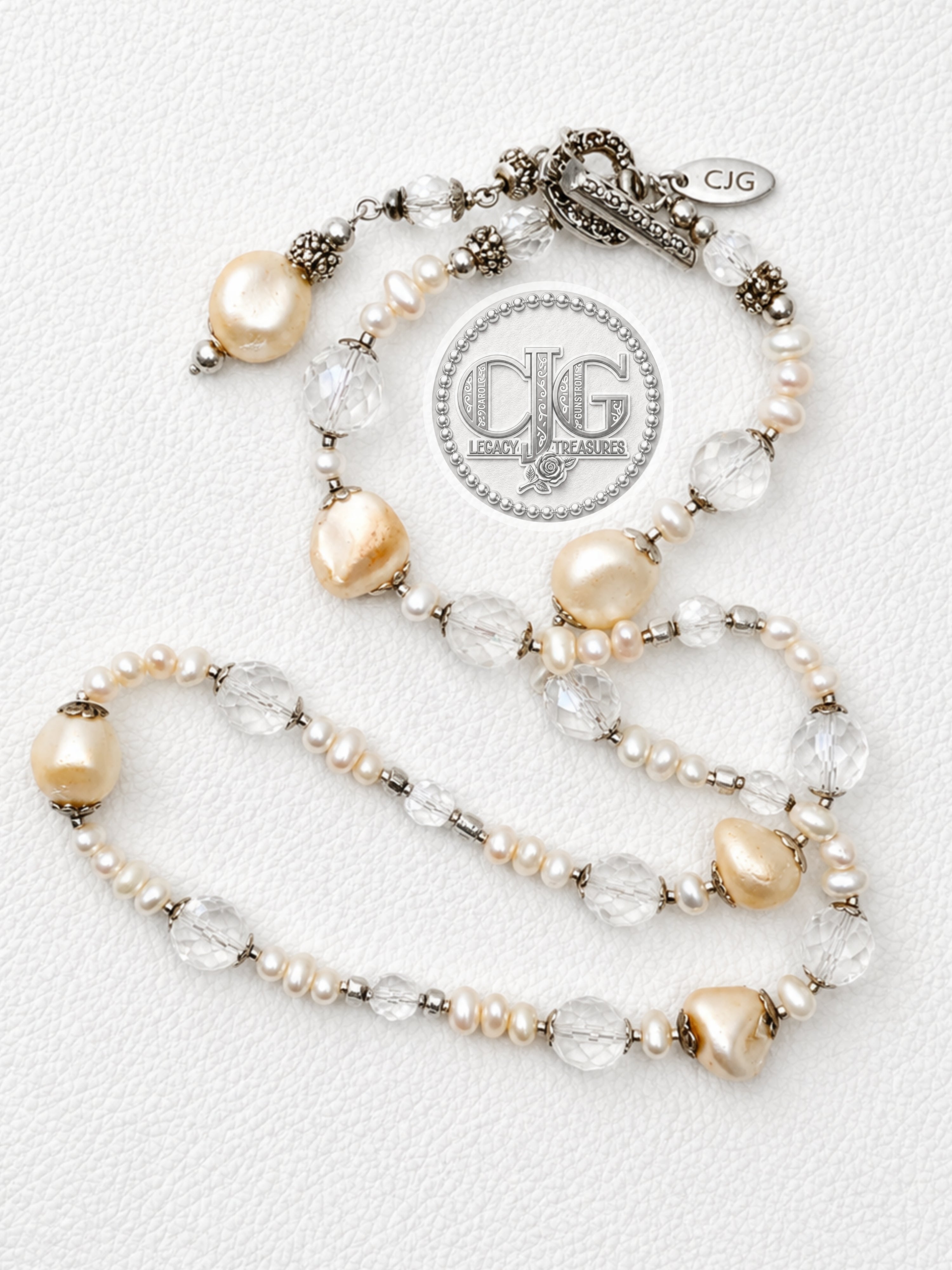 Close-up of champagne baroque pearls and faceted crystal beads