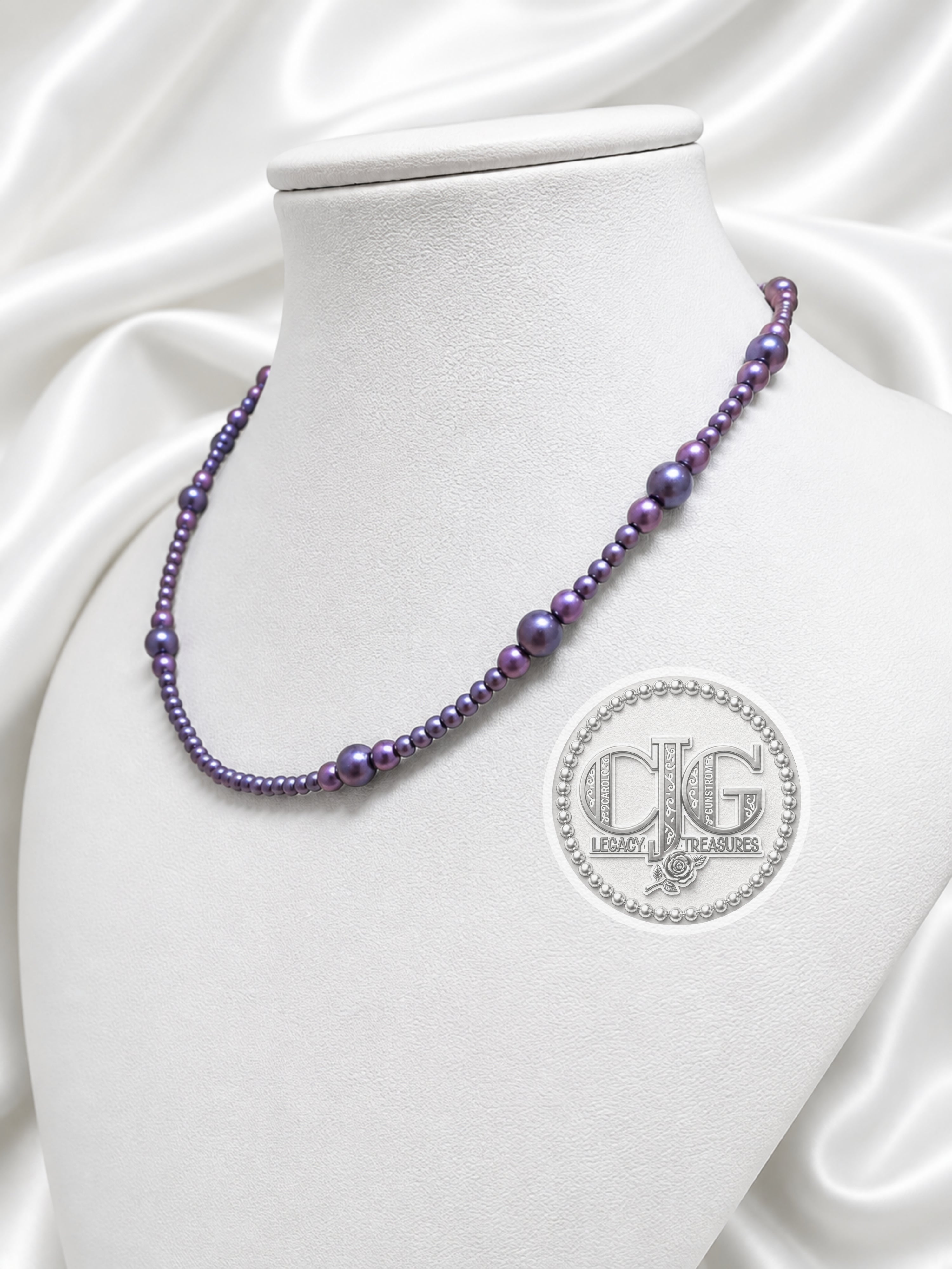 Full view of graduated baroque pearl necklace with lampwork glass bead and toggle clasp